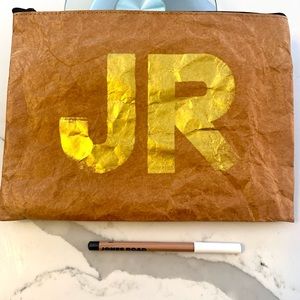 Jones Road makeup bag and shimmer, onyx eyeliner, pencil